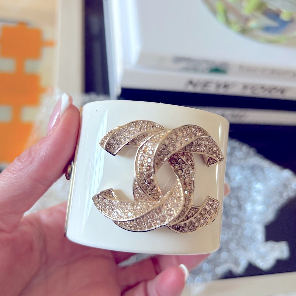 Chanel resin off white cuff with sparkly rose gold CC sign